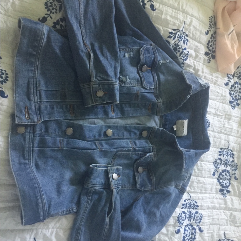 Size S fits like a M blue Jean jacket distressed